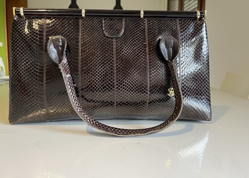 Borsa pochette vera pelle - in,
