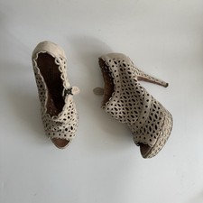 ALAIA TRONCHETTI  PELLE SCAMOSCIATA TRAFORATA