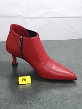 Tronchetto a punta in pelle