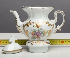 9) Teiera e scaldateiera in