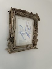 Cornice portafoto con legno