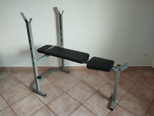 Panca piana regolabile con supporto bilanciere e portadischi lateriale