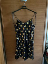Tubino nero con paillettes -