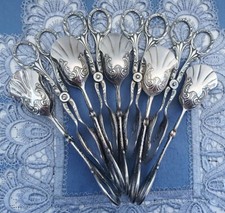 9 bellissime pinze argentate