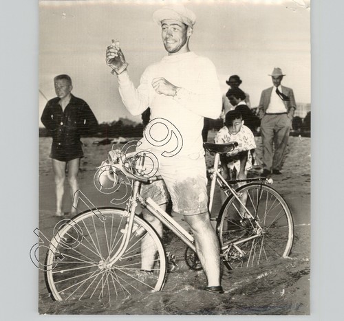 Ciclista francese spiaggia - in,