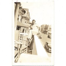Handsome Man Sitting On Porch