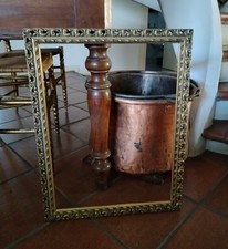 Antica cornice in legno dorato e traforato