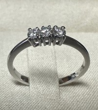 ANELLO TRILOGY IN ORO BIANCO 18 kt. CON DIAMANTI NATURALI TAGLIO BRILLANTE