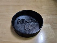 Tappo obiettivo anteriore per