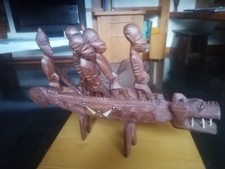 5 Guerrieri Africani in Barca con lancia