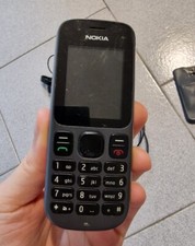 NOKIA 100 TELEFONO CELLULARE per PARTI di RICAMBIO con CARICABATTERIE