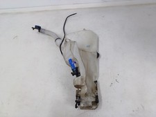 Bottiglia e motore lavatrice