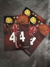 Scheda ufficiale Ferrari F1 2025 firmata Lewis Hamilton.