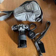 Fotocamera Nikkon FM2 con zoom