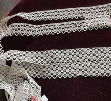 Pizzo antico con fusi ganci e