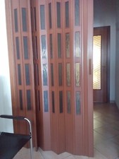 PORTA A SOFFIETTO PVC con