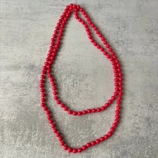 Collana lunga di perle in vetro rosse