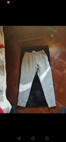 Tuta grigia nike con swoosh - nike,