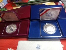 2 monete argento $ 1 dollaro