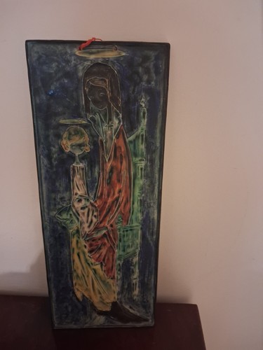 Scultura ceramica - su,