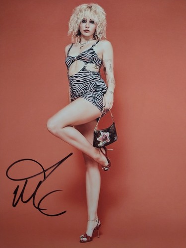 Foto miley cyrus autografata - foto,