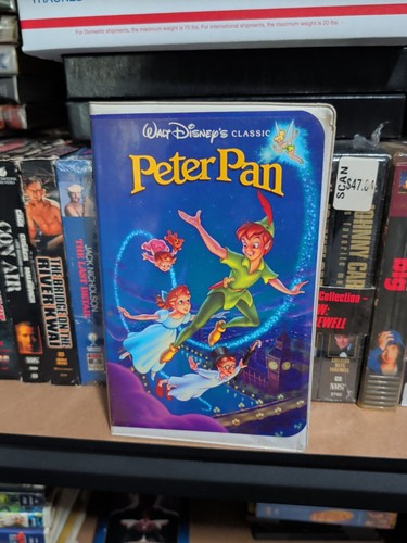 Walt disney home video peter - walt,