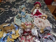 6 bambole in ceramica colori