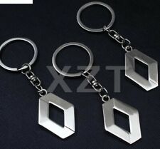 Portachiavi in metallo cromato double face con marchio Renault. 