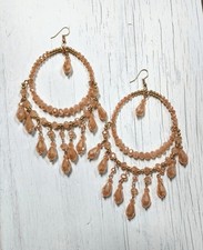 Orecchini pendenti grandi e