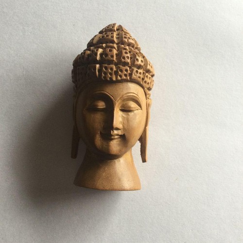 Testa buddha intagliata - intagliata, in