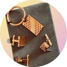 Set bracciale, spille e