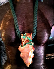 Amuleto scolpito fiamma