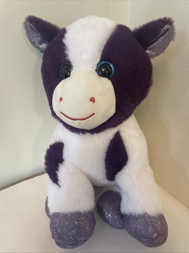 Peluche mucca viola occhi