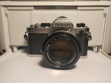 NIKON FM SILVER Fotocamera Analogica + NIKKOR Obiettivo 50 mm F. 1,4