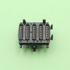 Stazione di tappatura testina