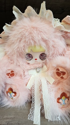 Peluche pupazzo occhi liquidi