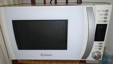 FORNO MICROONDE CANDY MODELLO CMXG20DW , COLORE BIANCO FUNZIONE SCONGELAMENTO