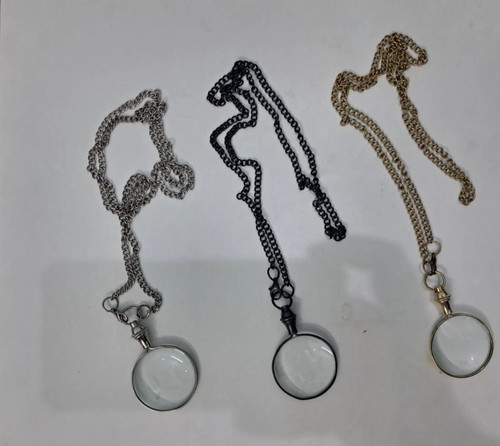 Collana con lente - , di