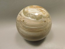 Sfera di pietra in legno di