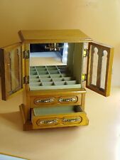 Portagioie carillon legno con due ante e due cassetti vintage . La musica si