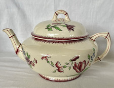 THEIERE VERSEUSE EN FAIENCE