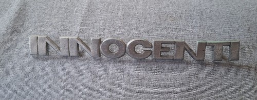 Scritta sigla fregio - , innocenti