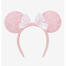 Orecchie rosa con fiocco a