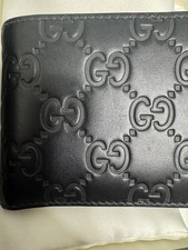 Authentic Gucci Signature