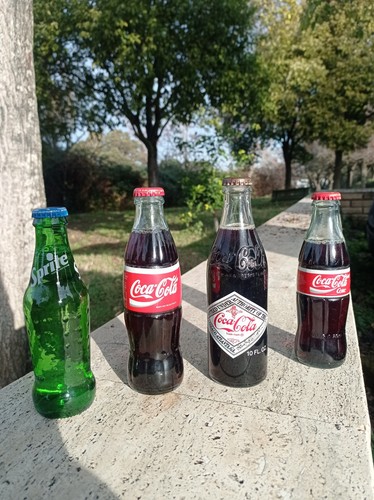Lotto bottigliette coca - 4,