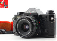 Canon AE-1 Program fotocamera pellicola nera nuova obiettivo FD 28mm f2.8 testata GIAPPONE [N COME NUOVA