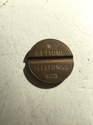 Gettone telefonico con - con, segno