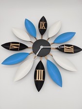 Orologio da parete grande a forma di foglia. D. 53 cm.  Batteria inclusa.