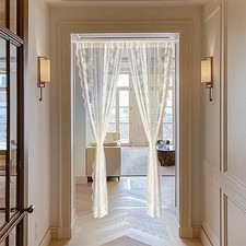 Tende in pizzo bianco ricamato