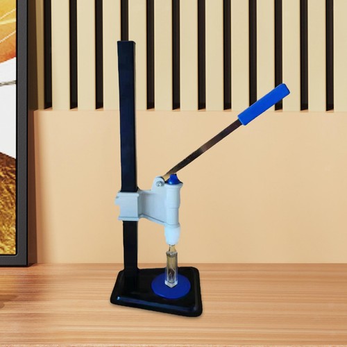 Tappatore manuale per profumo